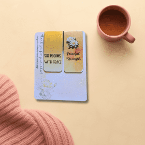 Quiet Strength Bookmark Duo featuring two encouraging magnetic bookmarks for readers. Each bookmark displays inspirational messages and floral designs, designed for easy page marking and organizing books.