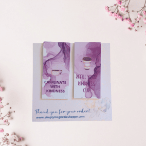 Caffeinate with Kindness magnetic bookmark duo, a teacup and a to-go cup in purple watercolor, on a thank-you card